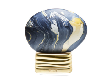 Frasco de perfume con forma de huevo de color azul y amarillo The House of Oud Get the Feeling