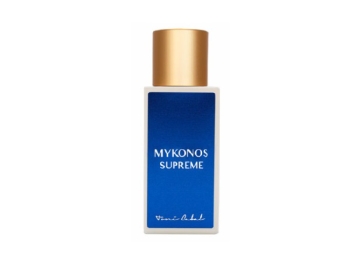 Frasco de perfume blanco con etiqueta azul y tapón dorado Toni Cabal Mykonos Supreme