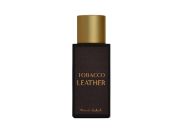 Frasco de perfume marron con tapon dorado Toni Cabal Tobacco Leather