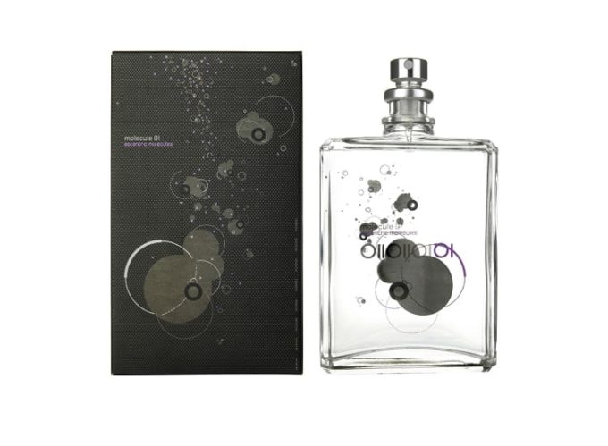 Frasco de perfume trasparente con serigrafias plateadas y moradas Escentric Molecules Molecule 01